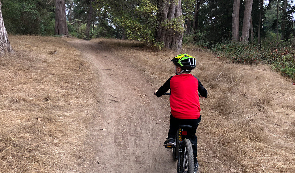 Boy on bike in Golden Gate Park