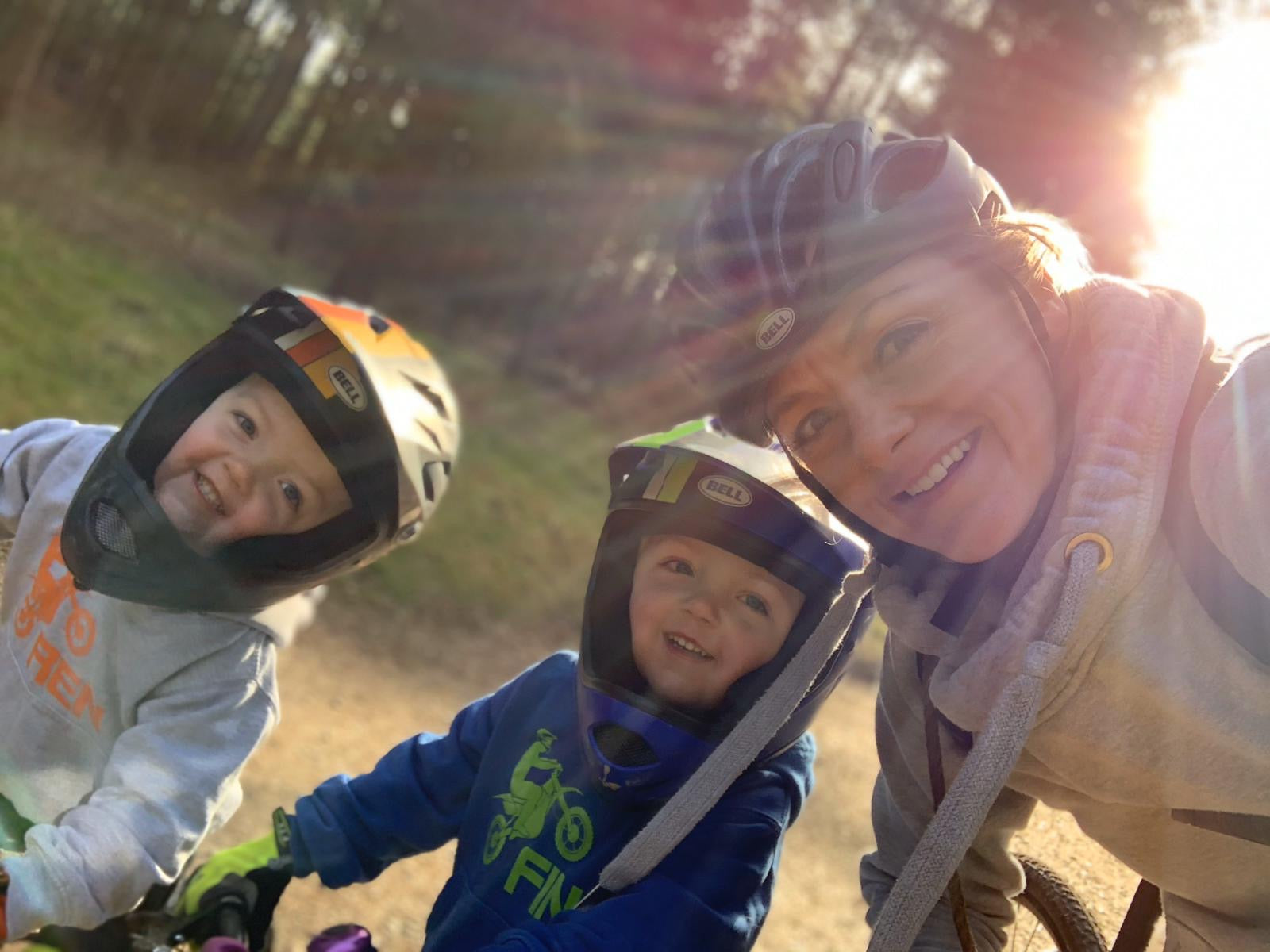 Boys on bikes with their mum