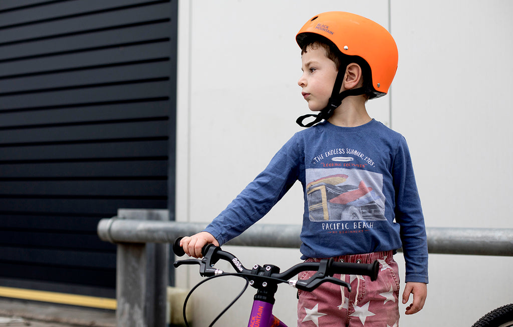 Child on balance bike