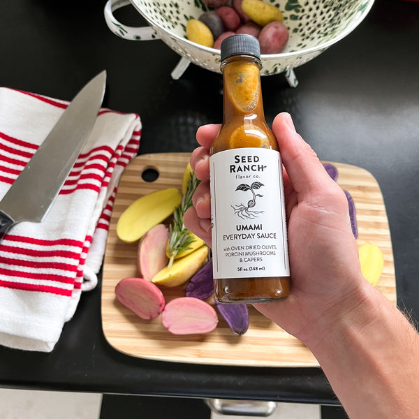 umami everyday gourmet sauce in a kitchen with potatoes and rosemary