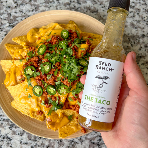 Plant-based nachos with chorizo and taco sauce