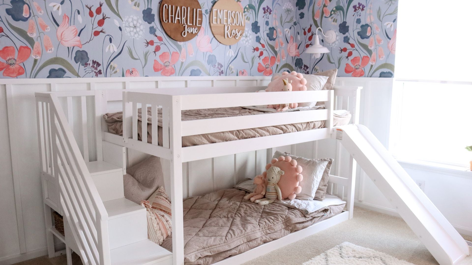 white low bunk bed with stairs and slide