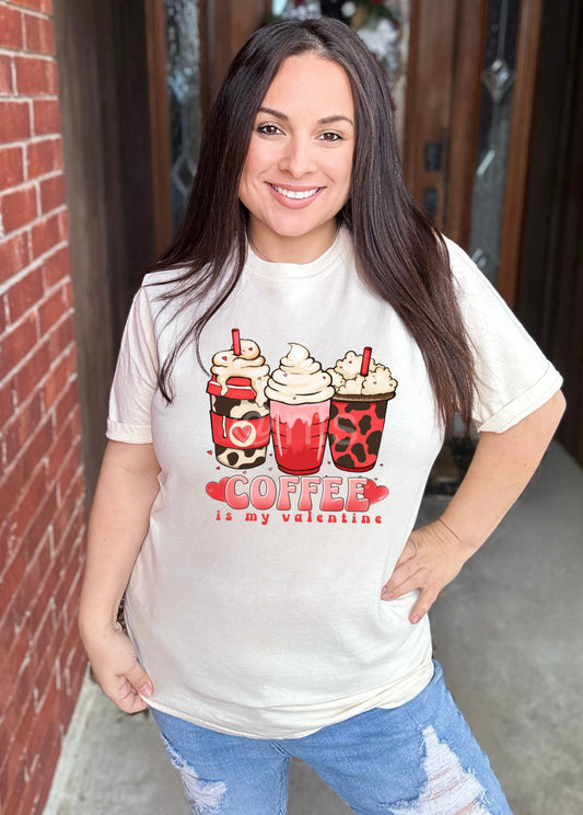 Get cozy with our Coffee is My Valentine Tee shirt for Women. Produced in soft and enduring cotton, this t-shirt features a funny design that reflects the joy of coffee. This tee is an absolute must for Valentine’s Day and beyond as well any coffee lover. 