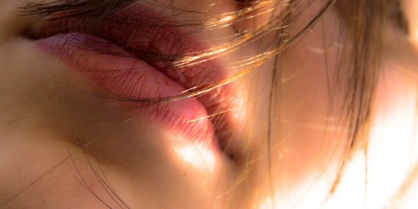 Close up of human lips, symbolizing cold sore treatment options.