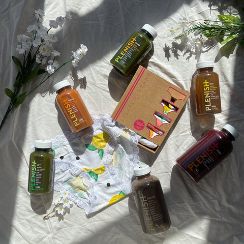 Flatlay of juices with boxes of knickers