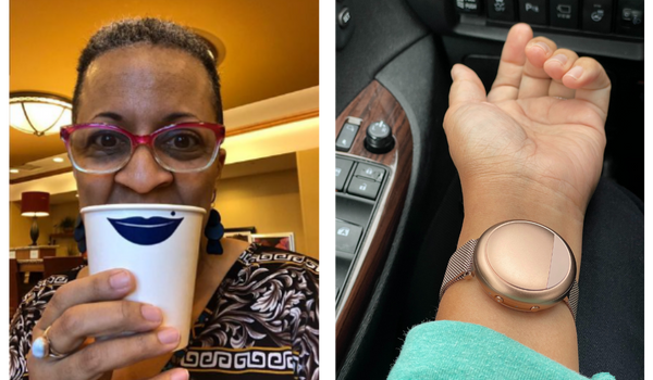 woman wearing glasses holding paper cup with lips printed on it in front of face, wrist wearing Rose Gold Embr Wave 2 wristband