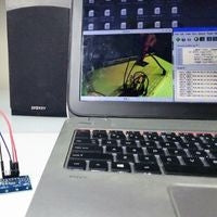 Laptop with Python code controlling capacitive touch sensor