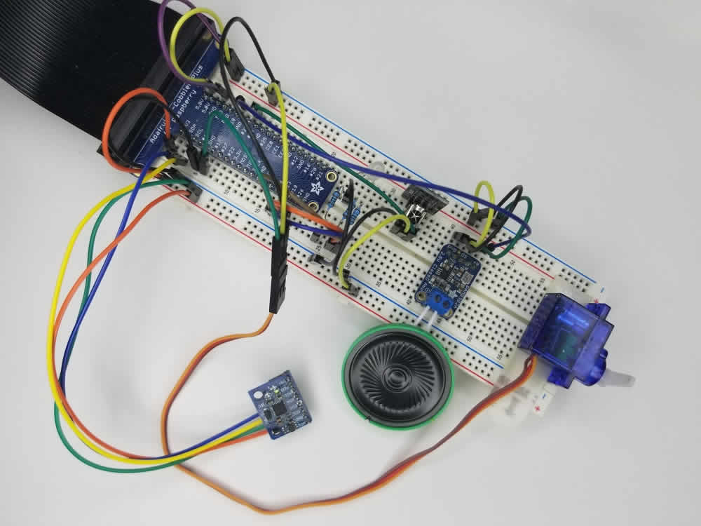 Breadboard circuit including speaker and accelerometer