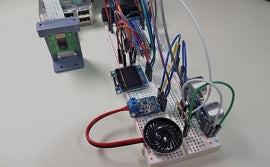 Raspberry Pi and Python Breadboard Circuit with Camera, Speaker, Amplifier, and OLED Screen