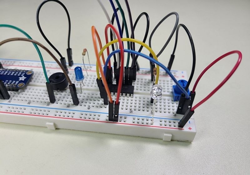 Raspberry Pi Python Breadboard Circuit with Piezo Speaker, Phototransistor, and Potentiometer