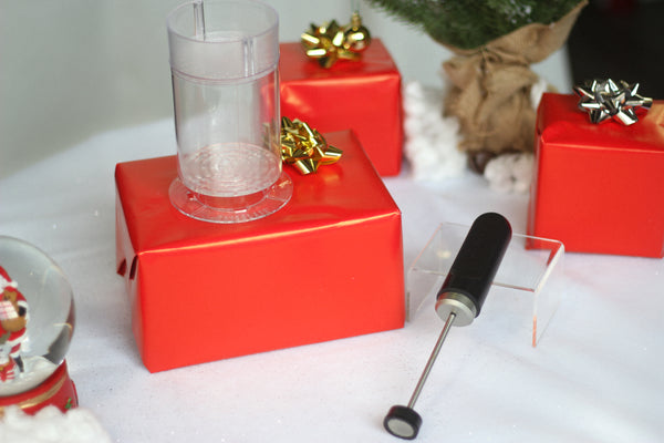 An image of a Subminimal Nanofoamer with Christmas presents in the background.