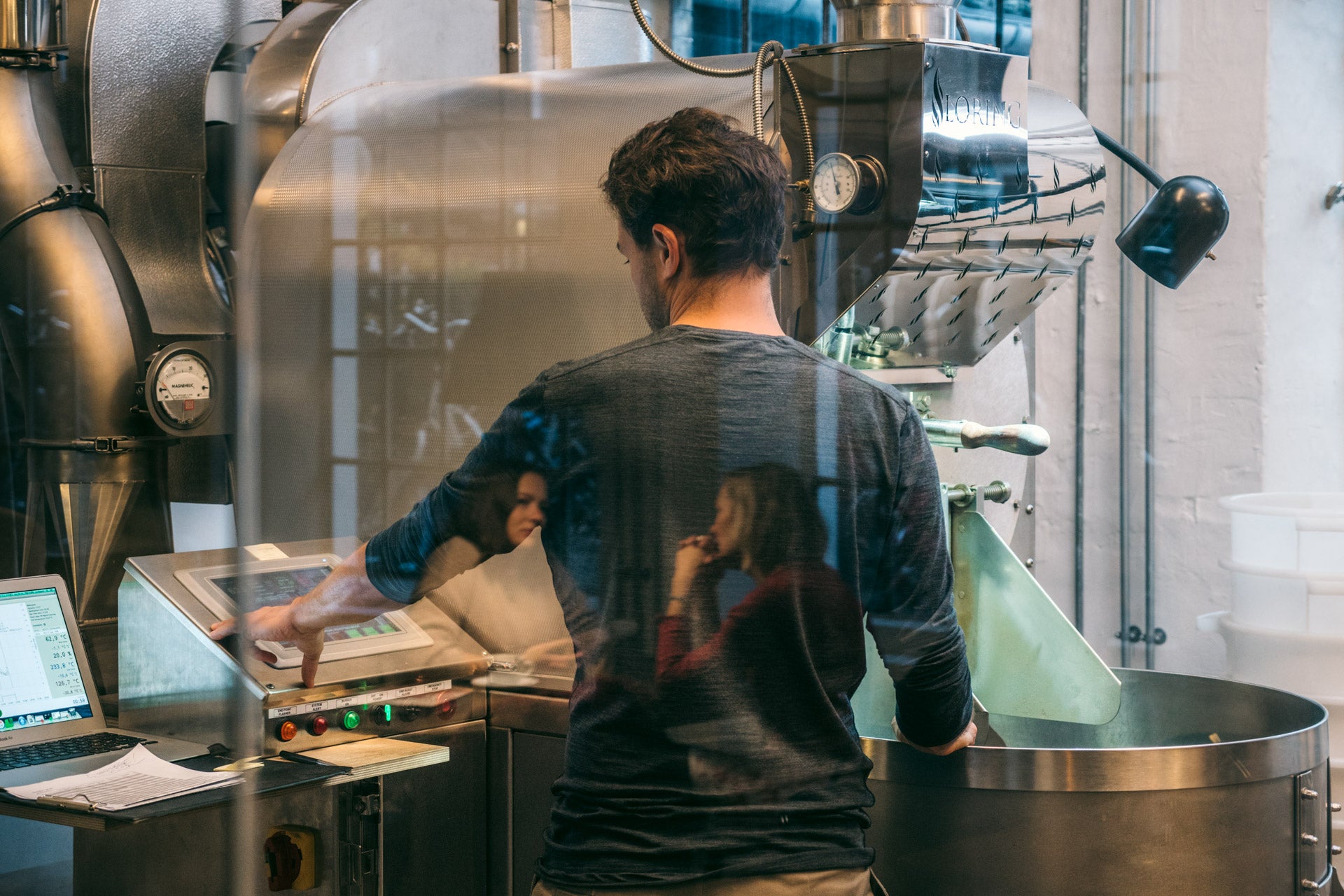 Casper Engel Rasmussen at work on a commercial coffee roaster