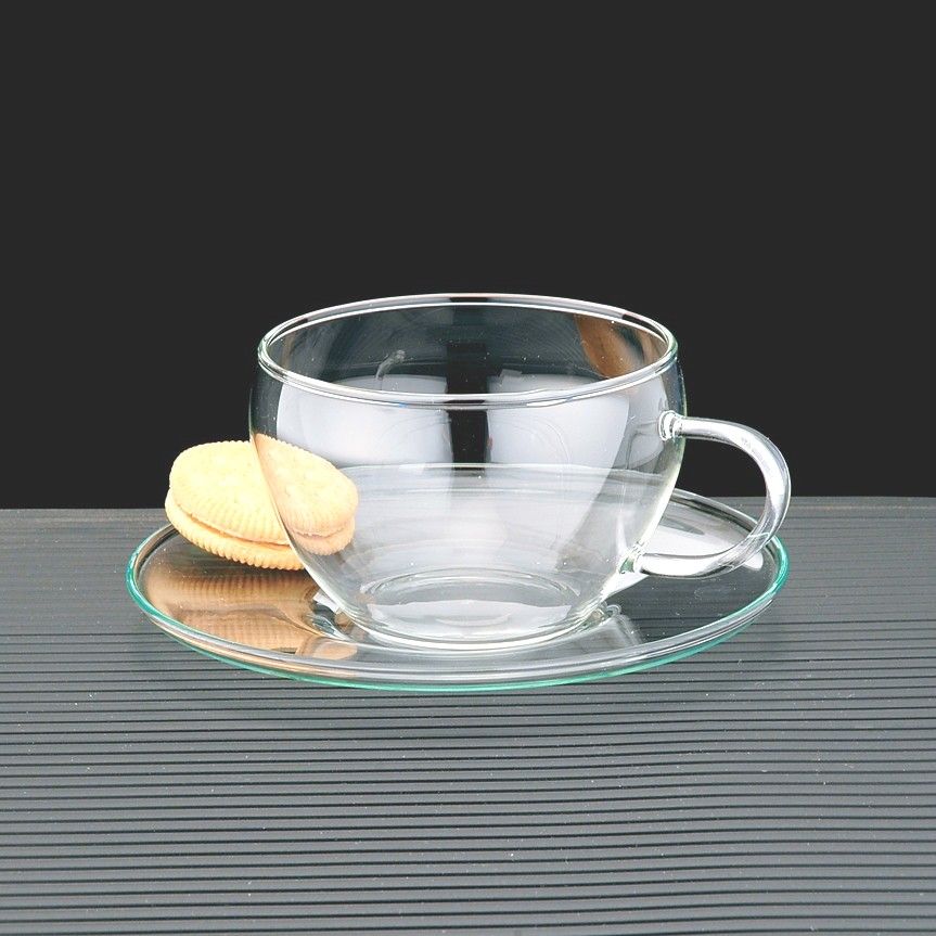 glass cup and saucer