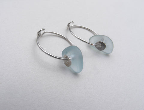 Sea Foam sea glass hoop earrings with a molten silver sequin.