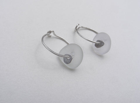 Sea Foam sea glass hoop earrings with a molten silver sequin.