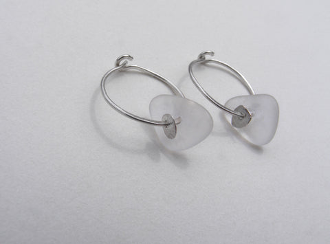 Sea Foam sea glass hoop earrings with a molten silver sequin.