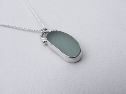 Sea Foam sea glass silver bezel set pendant with an 18 inch silver curb chain