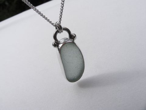 Sea Foam sea glass silver bezel set pendant with an 18 inch silver curb chain