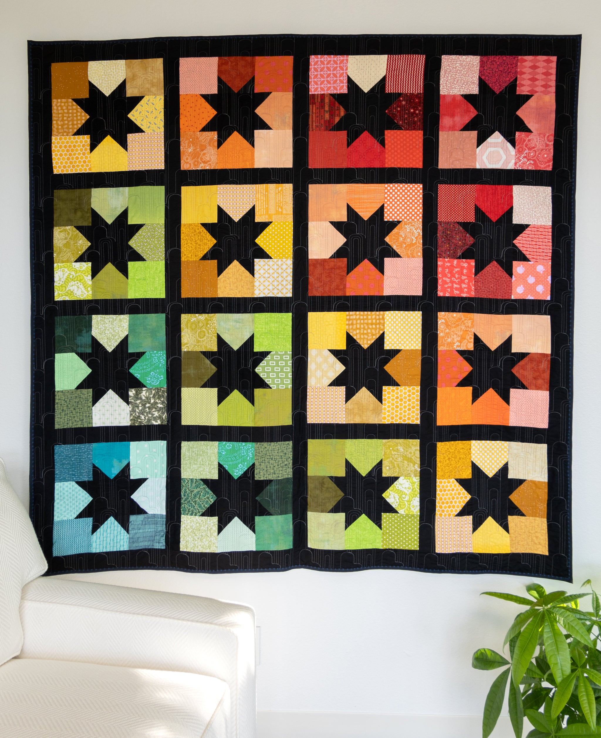 Joyful Stars quilt in rainbow by Sewfinity