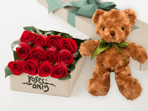 bouquet of roses with teddy bear