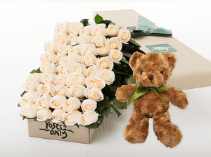 flowers and teddy bear