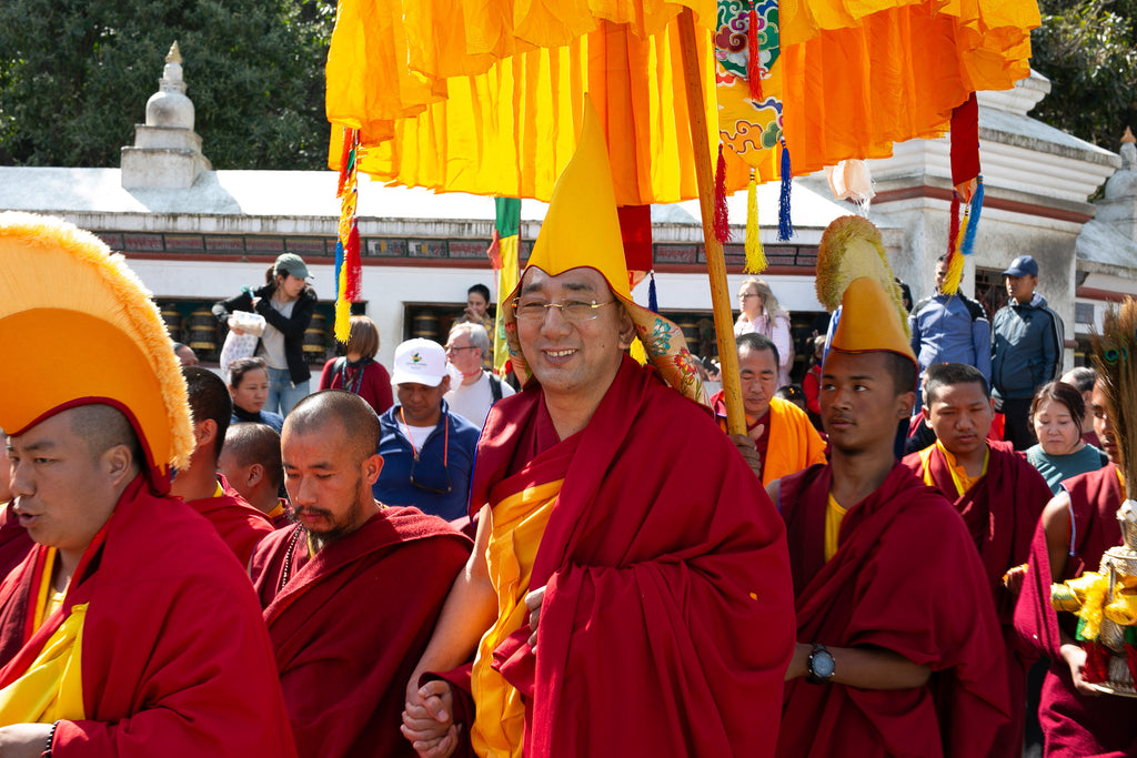 Lama walking through the streets during great prayer festival