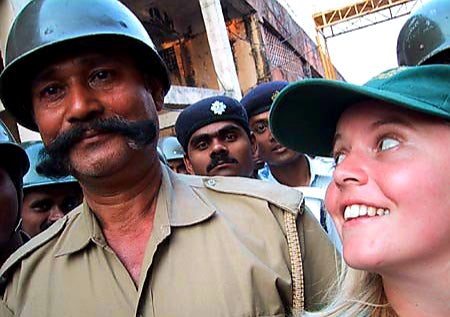 Australian Cricket Tours - Cassandra Hewett Smiles Broadly At A Police Officer Outside Eden Gardens, Kolkata During The 2nd Test Match Between Australia vs India 2001