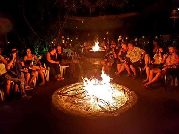 Australian Cricket Tourists Sit Around The Fire Inside A Boma At Schotia Private Game Reserve | Port Elizabeth | Eastern Cape | South Africa | Australian Cricket Tours