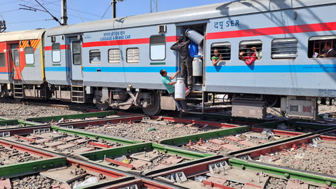 Caterers Scramble To Board A Train Passing Over The Nagpur Diamond Crossing | Nagpur | India | Australian Cricket Tours