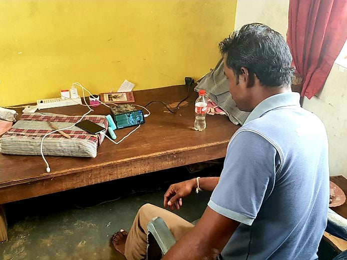 The Station Master Of Elephant Pass Railway Station Watches Cricket On His Mobile Phone Whilst Waiting For The Next Train To Stop Or Pass | Sri Lanka | Australian Cricket Tours