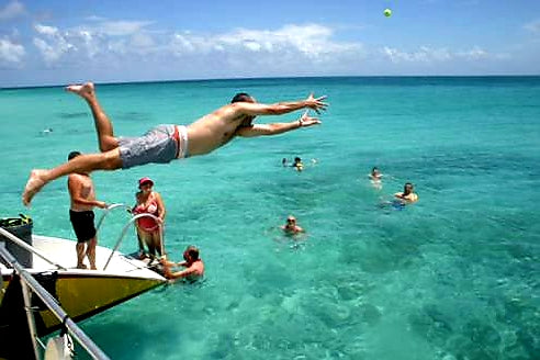 Australian Cricket Tours - Diving Into The Cobalt Waters Of Antigua To Catch A Tennis Ball Whilst Enjoying A Wadadli Catamaran Day Trip Around Antigua
