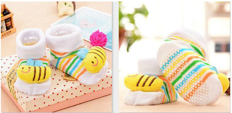 pair of socks with a sewn fabric bee