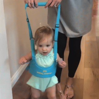baby walking with harness
