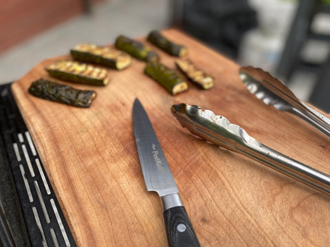 Matchless Made cutting board with PostKnife utility knife