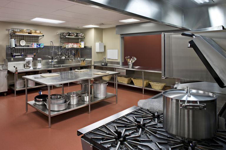 commercial kitchen work table with storage above