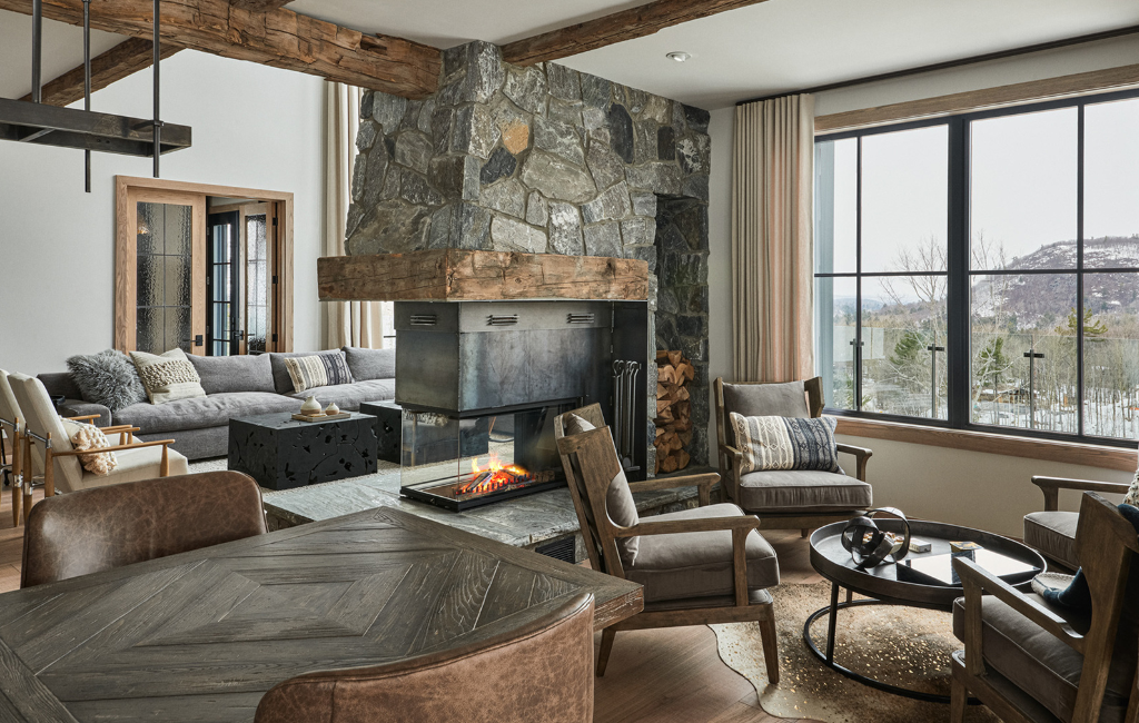 rustic interior design style living room fireplace dining room exposed stone wood