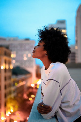 A woman on a balcony