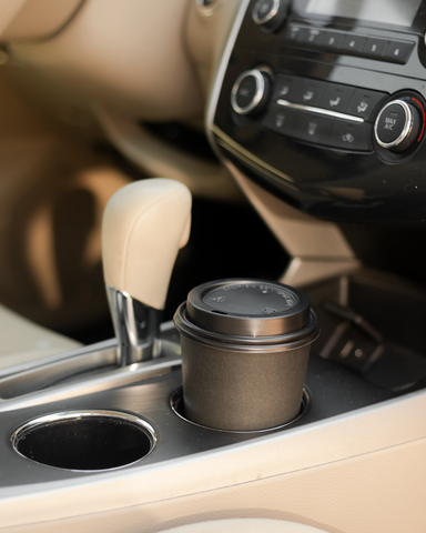 Disposable Coffee Cup in Car