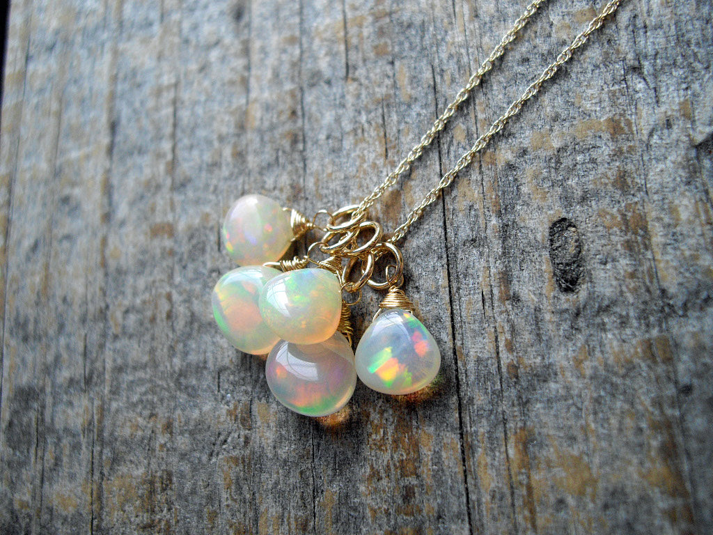 Crystal Opal Cluster Pendant (Recommended) - Biographie