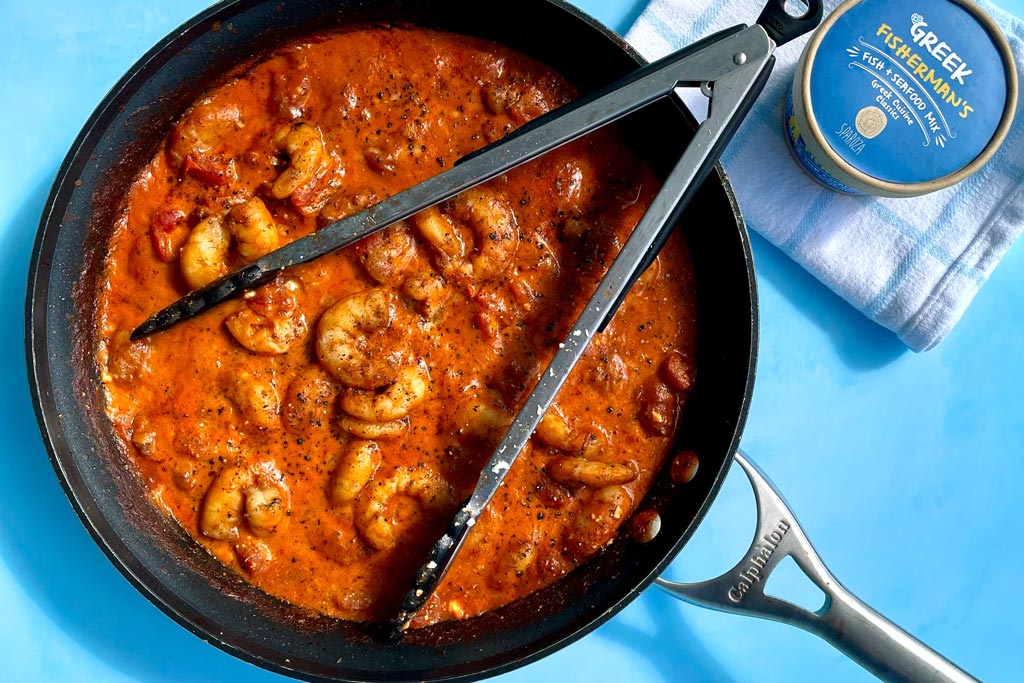 Stovetop Greek shrimp saganaki with feta cheese using Sparoza Fisherman's fish and seafood cooking blend