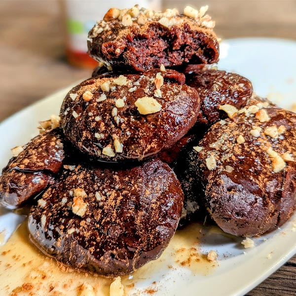 Chocolate melomakarona, traditional Greek christmas cookie, with Zelos honey