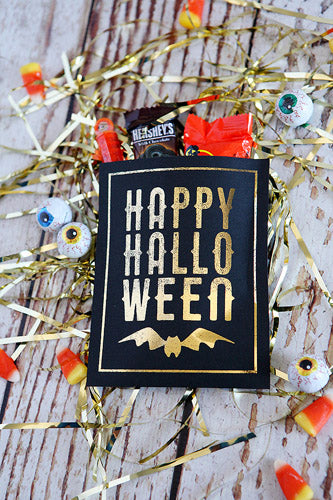 12 Free Halloween Printables- Get your home and candy ready for Halloween with free printable Halloween wall art, labels, treat bag toppers, and more! | #Halloween #freePrintables #wallArt #HalloweenDecor #DigitalDownloadShop