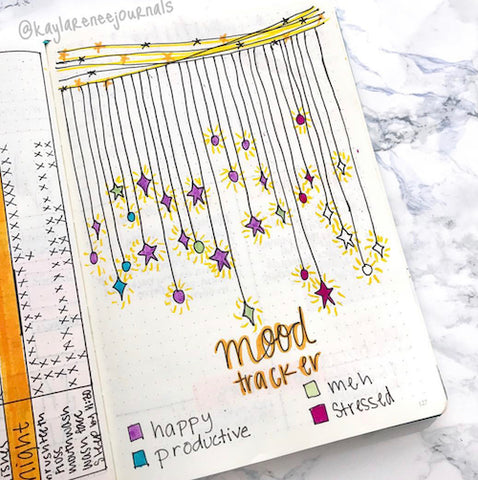 Summer Stars Bullet Journal Mood Tracker- Get your bullet journal ready for summer with these gorgeous summer bujo ideas! You have to see these inspiring summery trackers, layouts, covers, and more! | #bulletJournal #bujo #bujoIdeas #bujoInspiration #DigitalDownloadShop