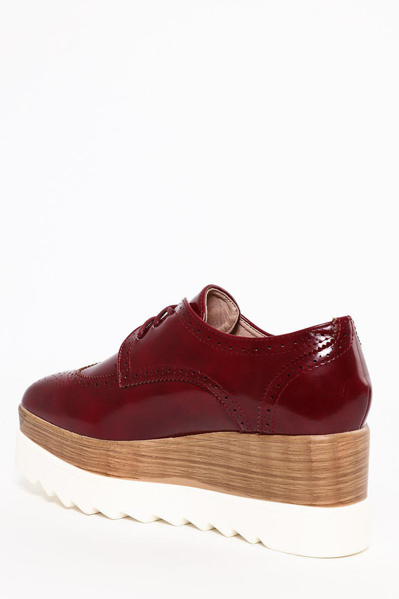 red patent brogues