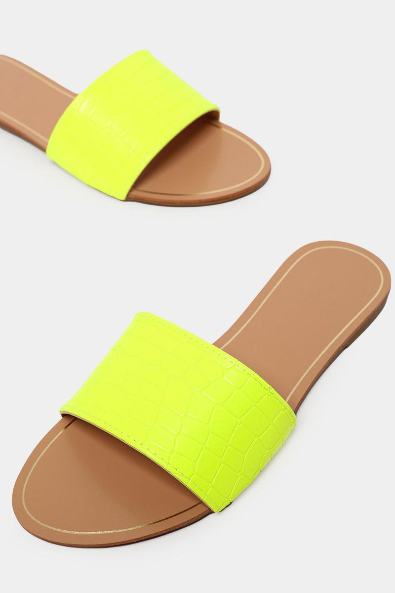 neon yellow crocs