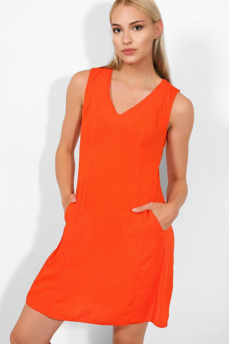 orange sleeveless dress