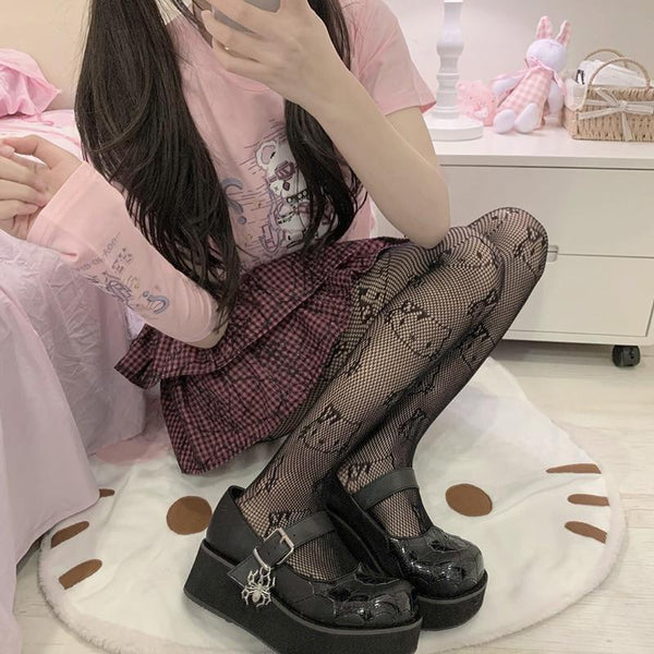 https://cdn.shopify.com/s/files/1/2417/6849/products/kitten-fishnets-black-kitty-cats-fish-net-fishnet-ddlg-playground-625_600x.jpg?v=1631837232