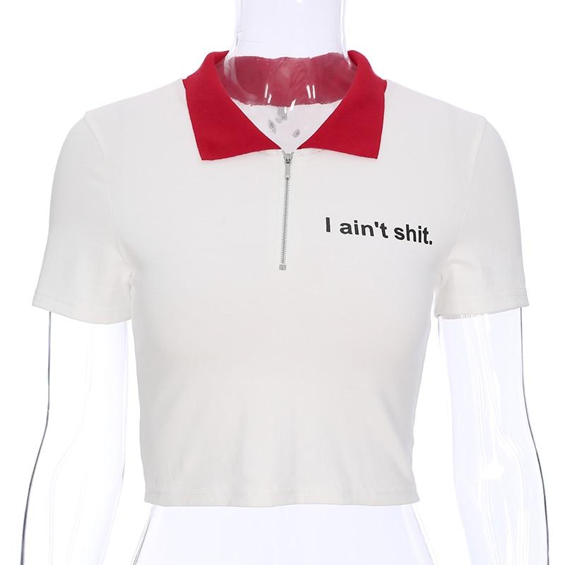 white t shirt with red collar