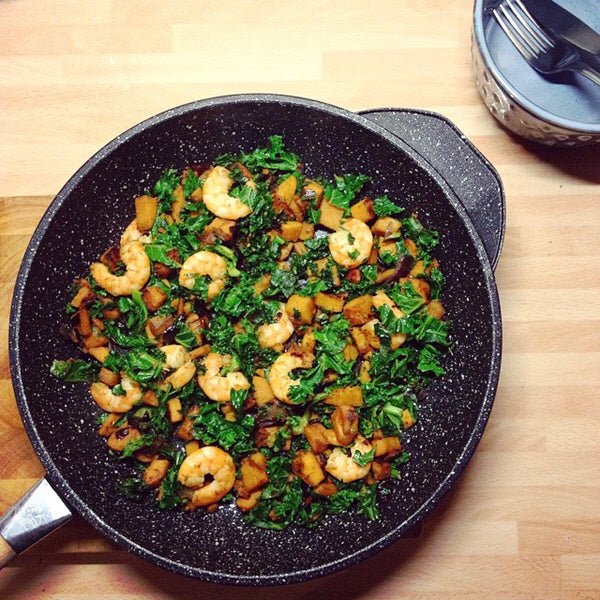 Sweet potato, kale and king prawn skillet