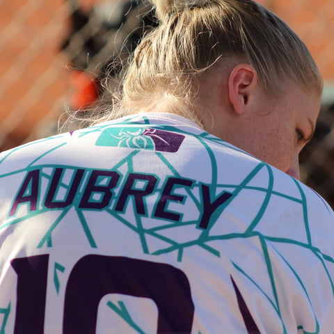 teal and purple jersey